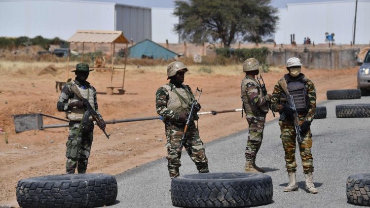 File picture of Nigerien soldiers patrolling outside Diffa airport in South East Niger.