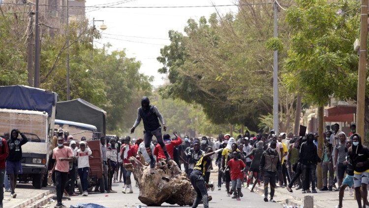 Demonstrators in Dakar, Senegal, barricade a road during a protest against the arrest of opposition leader, Ousmane Sonko