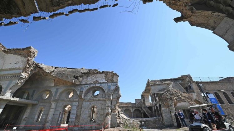 Pope Francis at the ruins of the Syriac Catholic Church of the Immaculate Conception in Mosul during his visit to Syria