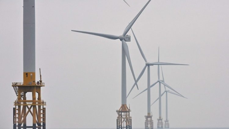 Wind turbine towers generate electricity off the coast of South Korea