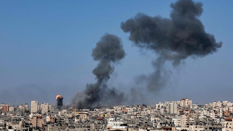 Smoke billows following Israeli air strikes on Gaza City on Wednesday