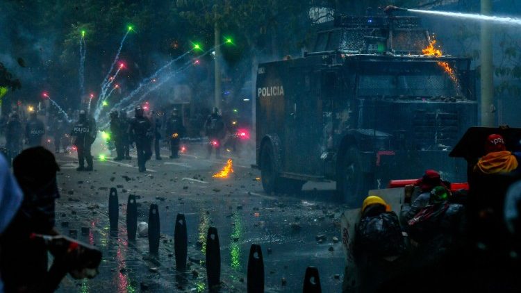 Protesters clash with riot police in Medellin, Colombia