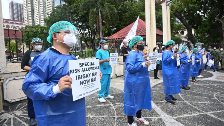 Philippine health workers demanding risk allowances amid Covid-19 surge.