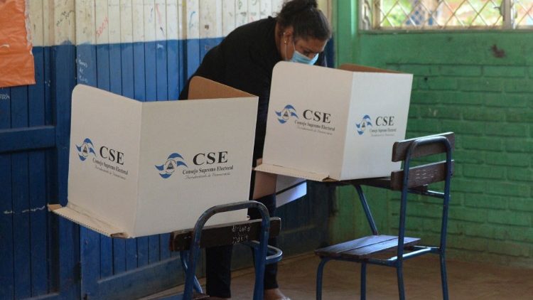 A woman prepares to cast her vote in Nicaragua's election