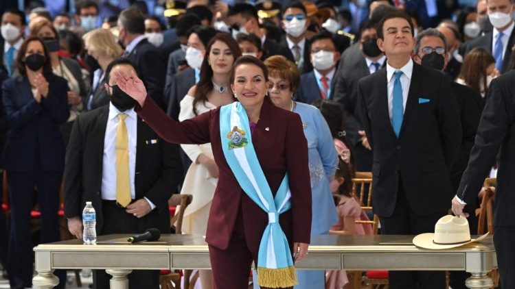 President Xiomara Castro waves during her inauguration ceremony on Thursday