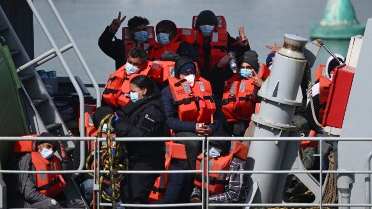 Migrants are picked up off the coast of Dover by UK Border Force boat