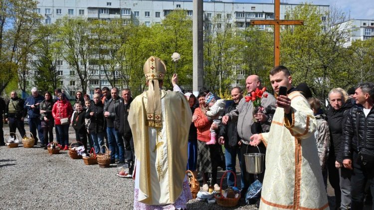 The blessing  of Easter baskets outside the Greek Catholic Church of St. Nicholas in Kharkiv, Ukraine