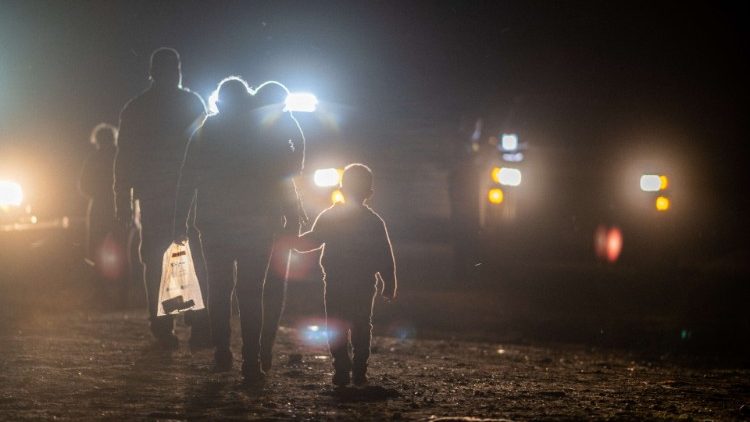 Migrant family crossing the border in Texas, USA