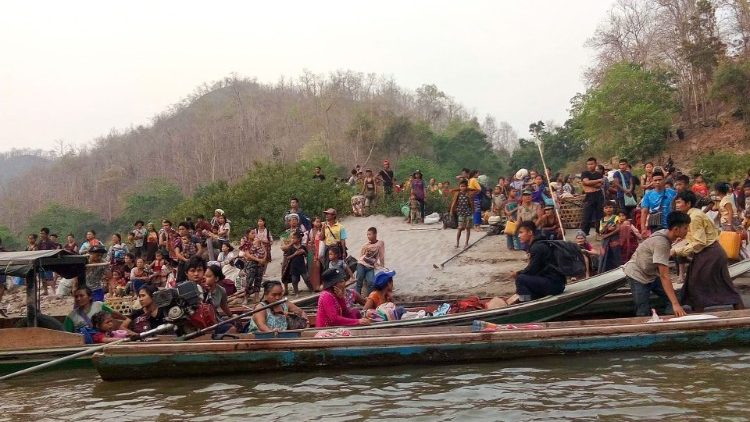 Karen people crossing the Salween river into Thailand to seek refuge from airstrikes in Myanmar's eastern Karen state