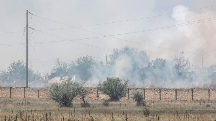 Smoke billowing from a munitions depot in the village of Mayskoye, Crimea.