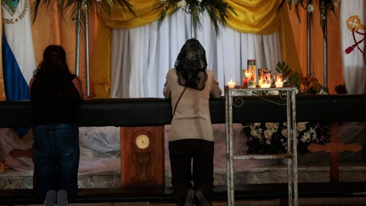 People at prayer in a church in Nicaragua
