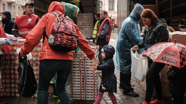 Caritas staff distributes food in Kharkiv
