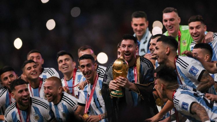 Argentina lift the FIFA World Cup Trophy after their victory on Sunday