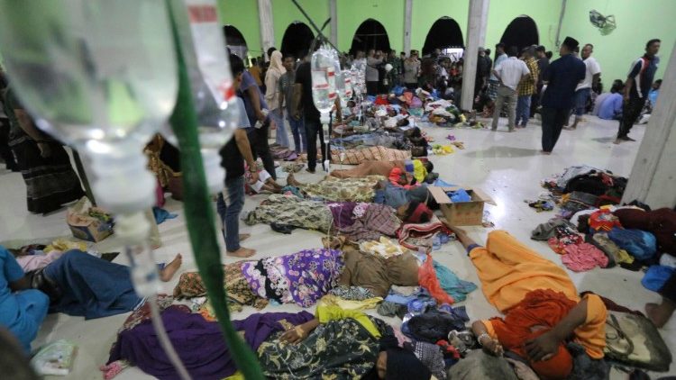 The Rohingya men receive treatment in Indonesia