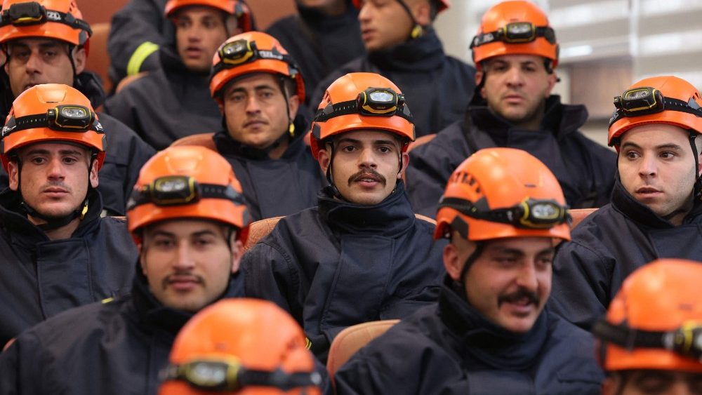 A Palestinian relief team is briefed before their departure to Syria and Turkey following a deadly earthquake, on February 9, 2023 in the West Bank city of Ramallah. (Photo by AHMAD GHARABLI / AFP)