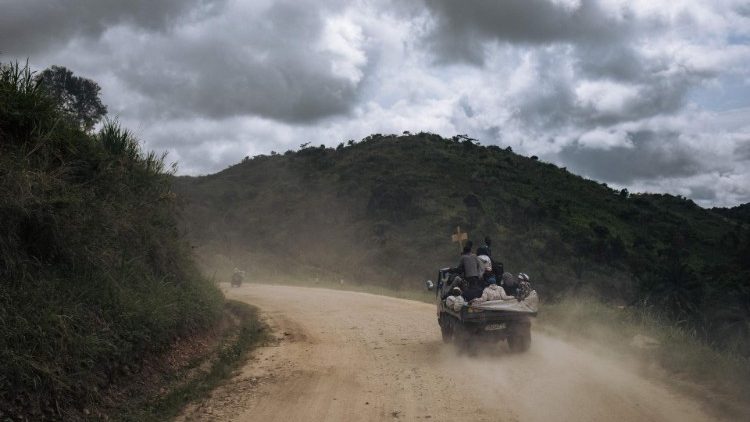 File photo of a funeral convoy after an attack on a village in northeastern Democratic Republic of Congo