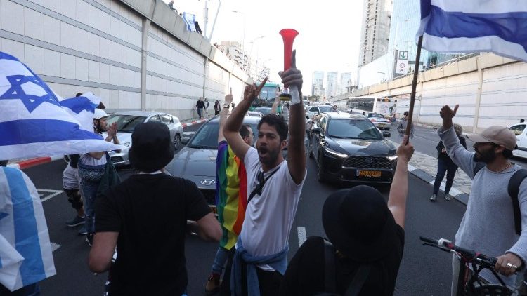 Israeli protesters block a highway during a rally against the government's judicial overhaul bill