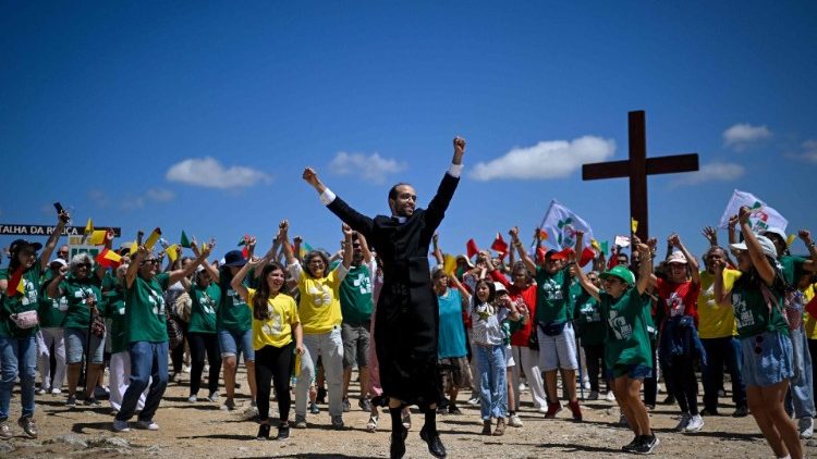 Portuguese pilgrims dance ahead of the World Youth Day celebrations in Lisbon, Portugal
