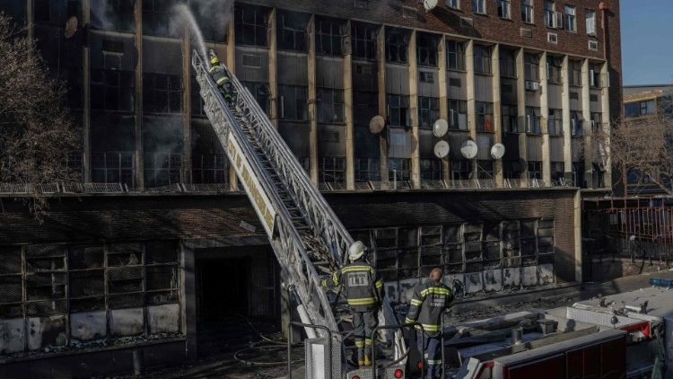The five-storey building in the city centre when it caught fire. 