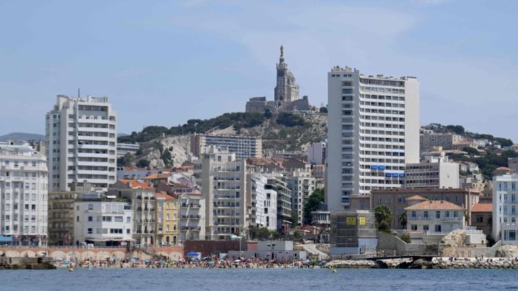 Marseilles: The Basilica of Notre Dame de la Garde, above, and the popular Plage des Catalans below