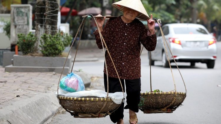 Betagter vietnamesischer Händler