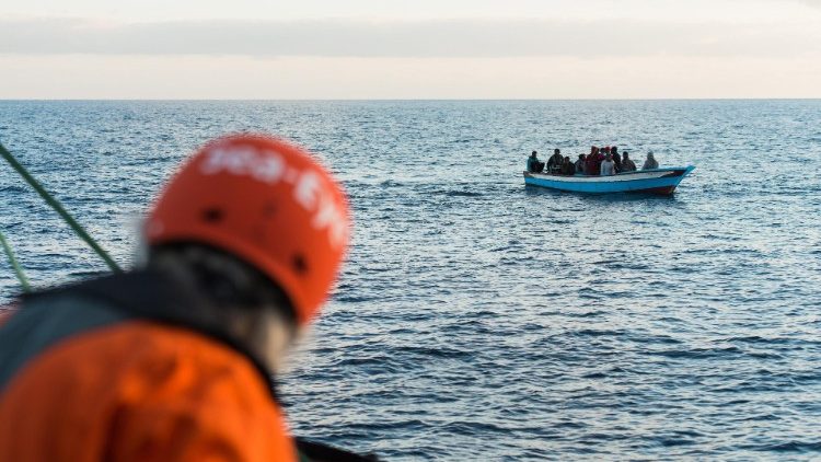 Migrants at sea attempting to cross the Mediterranean between Libya and Europe