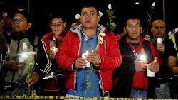 dozens-of-colombians-honor-the-dead-in-attack-1547782133245.jpg