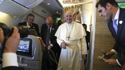 pope-francis-speaks-to-reporters-aboard-a-pla-1549203527851.jpg