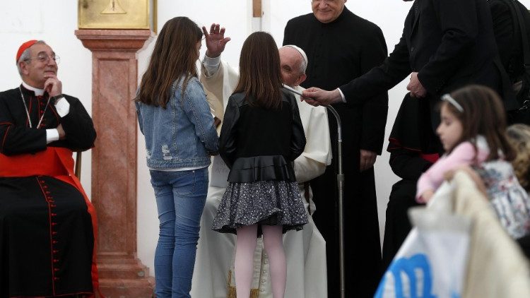 Pope Francis at San Giulio parish in Rome
