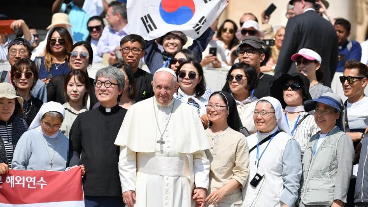 Pope Francis with Korean pilgrims at a General Audience in the Vatican in 2019. 