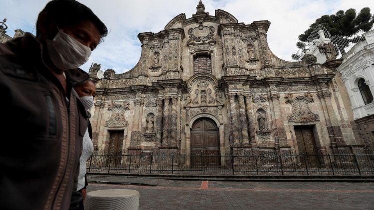 Man walking by a church closed due to the pandemic in Quito, Ecuador