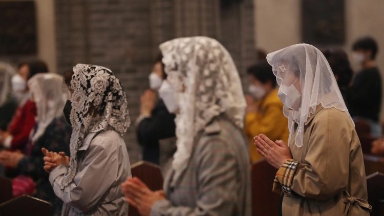 Korean Catholics attend Mass at Myeondong Cathedral 