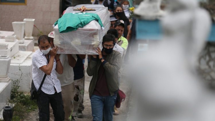 Mourners carry a coffin of a Covid-19 victim in Mexico City