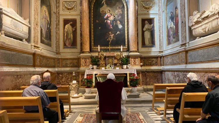 Pope Francis prays in the Chapel of Santa Monica