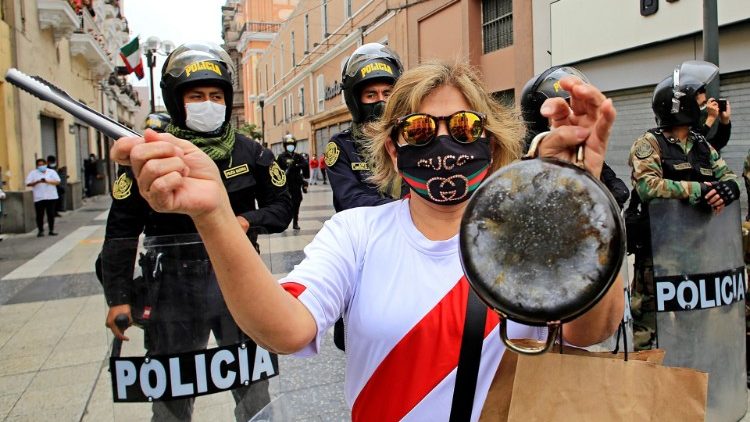 Protesters march to Congress against the inauguration of Peru's new president