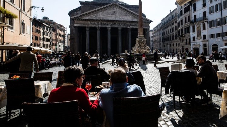 People enjoy Sunday leisure time near the Pantheon in Rome, Italy