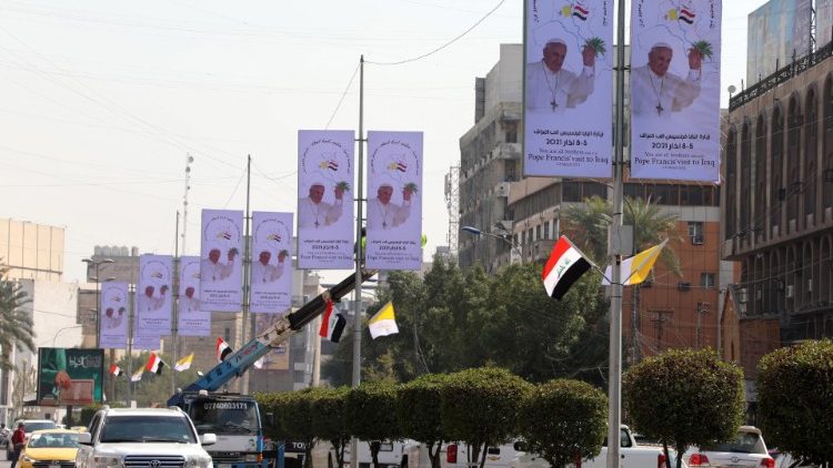 Banners welcoming Pope Francis along the streets of Baghdad