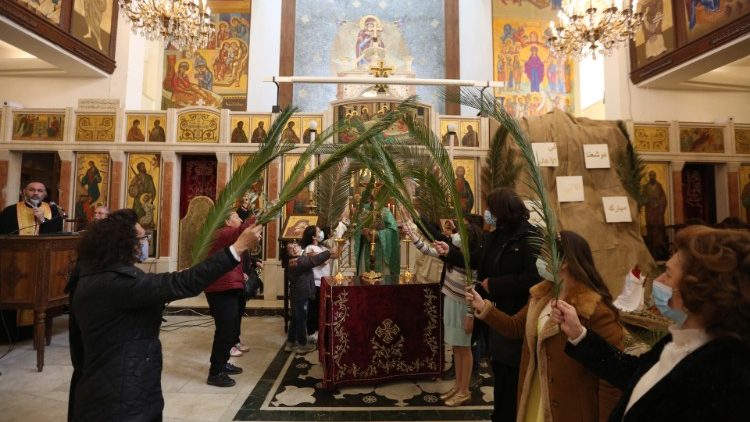 Dimanche des Rameaux dans une église de Damas en Syrie, le 28 mars 2021. 