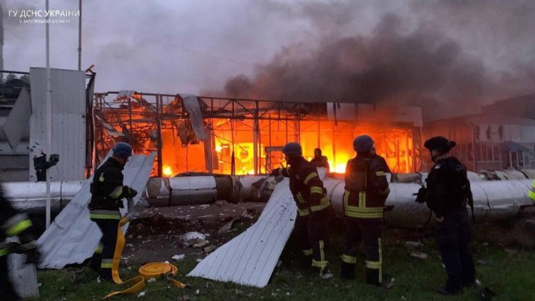 Ukrainian emergency services battle a fire following missile attacks