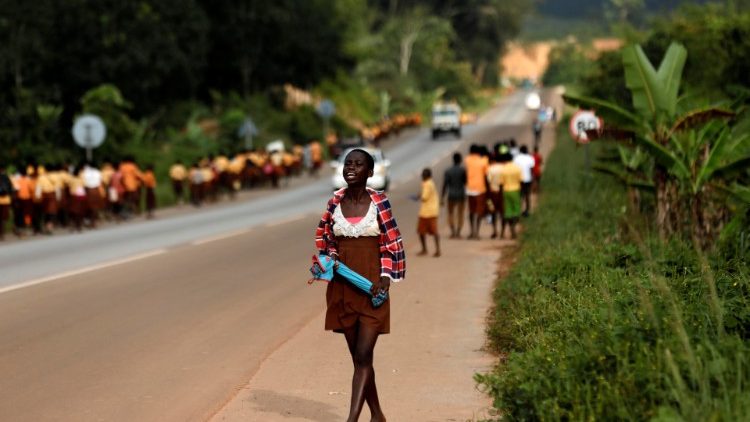 Schoolchildren walking home near Princess town, Ghana