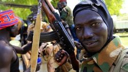 file-photo--south-sudanese-soldier-holds-his--1543449840145.JPG