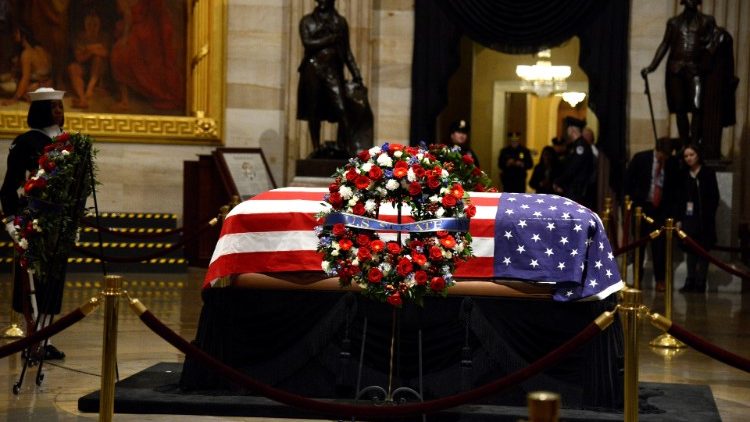 Casket of late President HW Bush departs Capitol