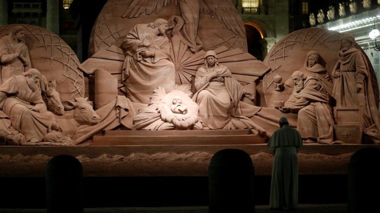 Pope Francis visits a nativity scene in Saint Peter's Square at the Vatican