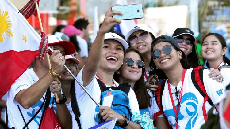 Pilgrims from the Philippines take a selfie ahead of Pope Francis visit for World Youth Day in Cocle