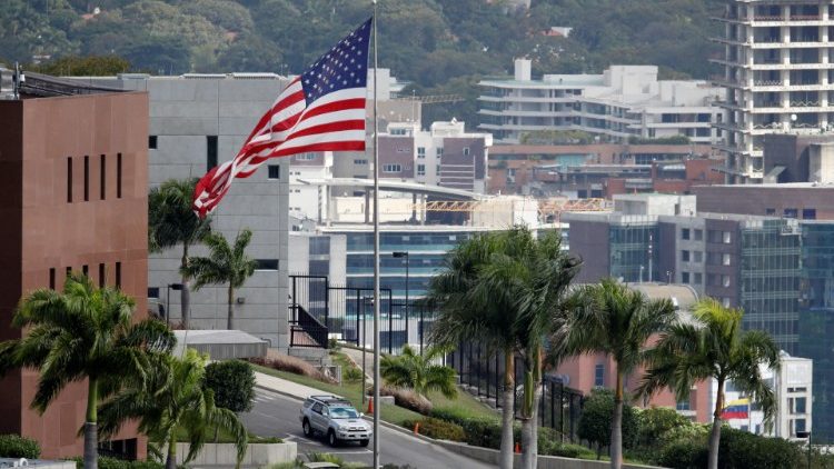A U.S. flag flutters at the U.S. Embassy in Caracas