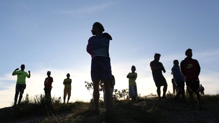 Venezuelans are seen at the Brazilian border with Venezuela, seen from Pacaraima
