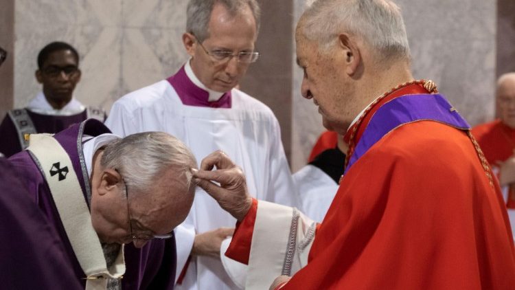 Pope Francis is sprinkled with ashes by cardinal Jozef Tomko during the Ash Wednesday mass at the Santa Sabina Basilica in Rome