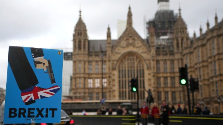 An anti-Brexit placard is seen outside the Houses of Parliament in London