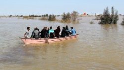 people-are-seen-on-a-boat-after-a-flooding-in-1553604836486.JPG