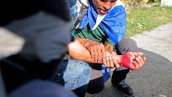 demonstrators-help-an-injured-protester-durin-1553987364782.JPG